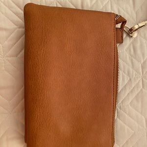 Gold cross-body bag coverts to wristlet